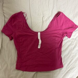 Pink Lululemon short sleeve workout top